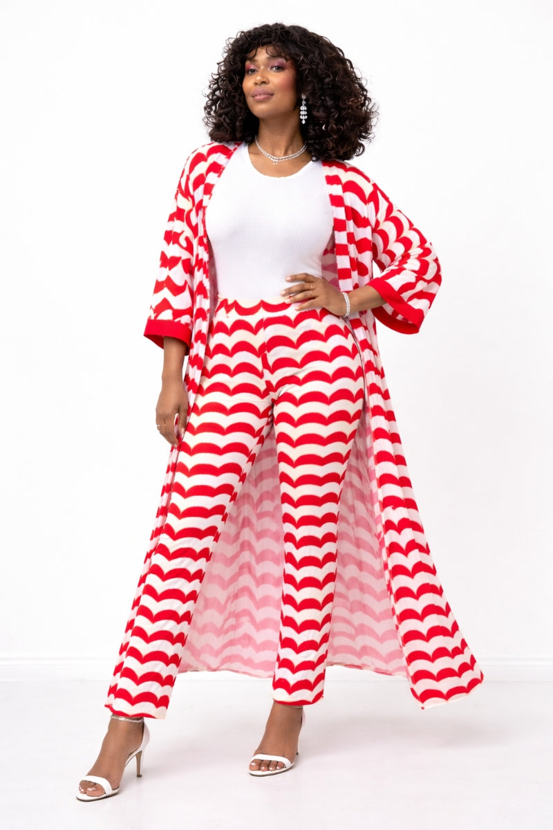 Woman wearing a red and white striped outfit on a white background