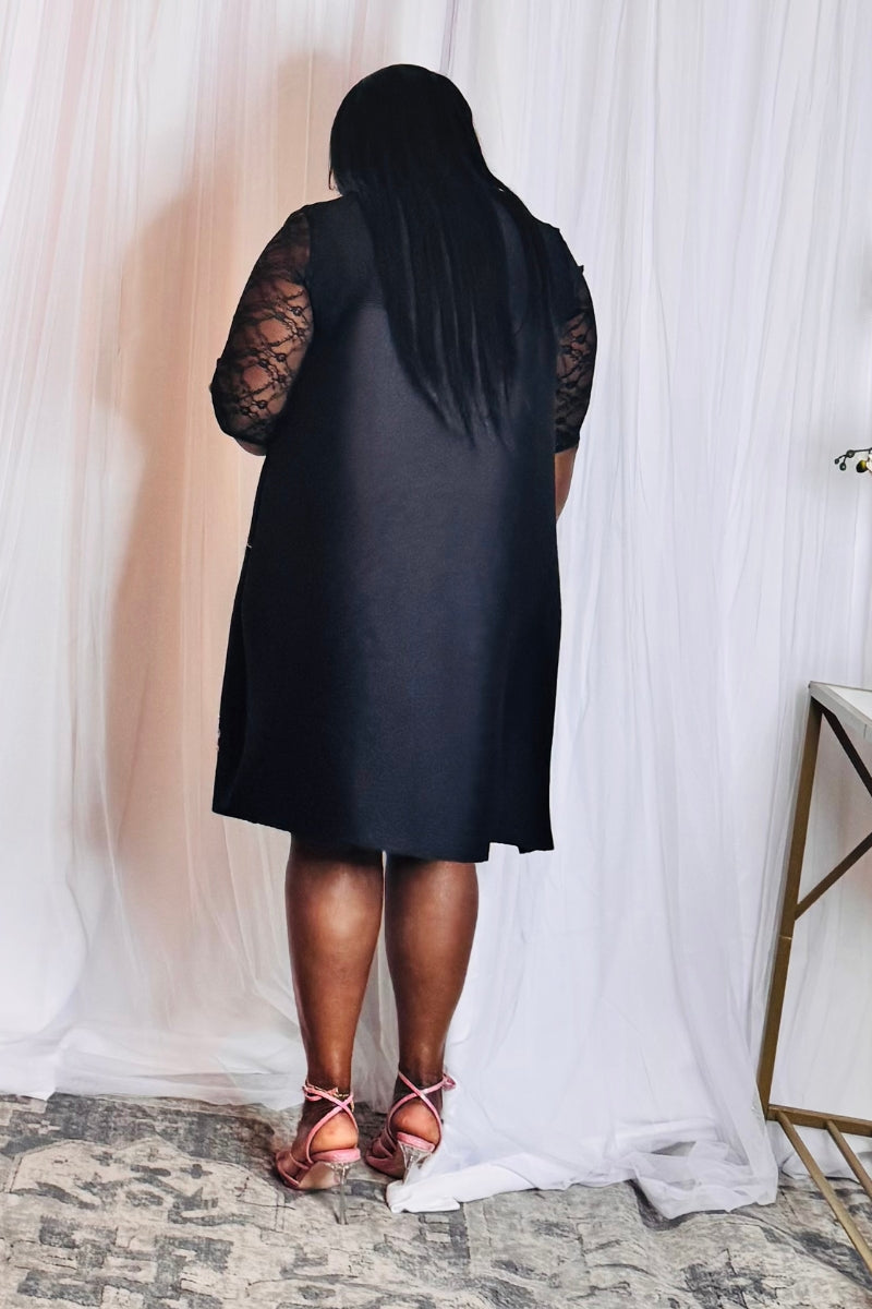 Black cocktail dress with see-through lace sleeves – styled for events