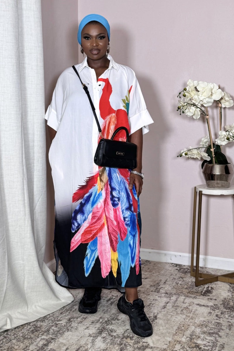 Side view of the Artist's Palette Brushstroke Shirt Dress showing the flowing ankle-length hem and short cuffed sleeves.