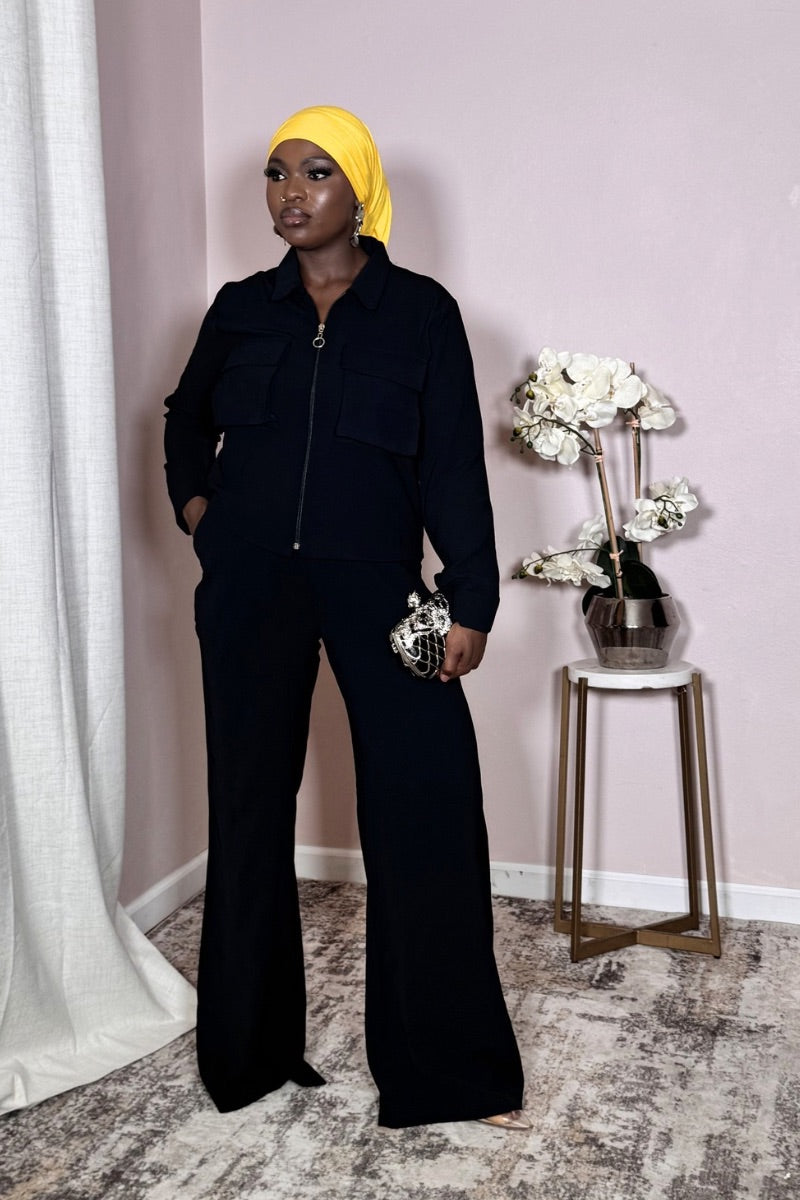 Model wearing Black Utility Cropped Zip Set with yellow hijab for editorial contrast.