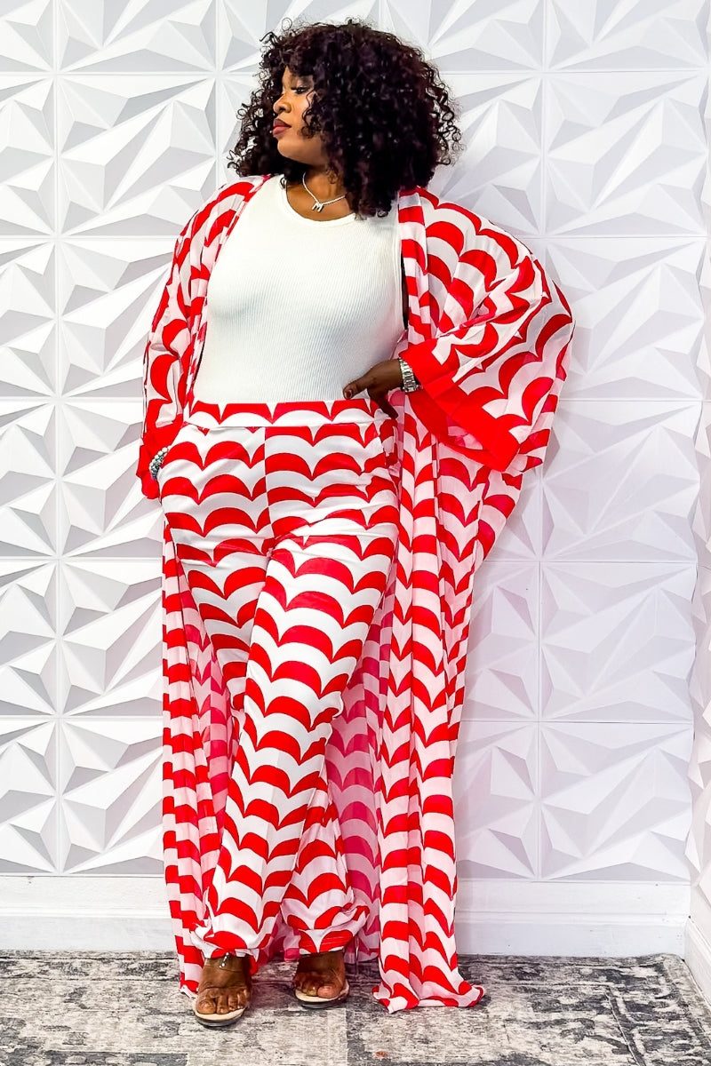 Stylish red and white printed duster and pant set paired with a white top, showcasing luxury and modest fashion from Opulent Shines.